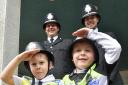 Officers and their sons at one of many pass out ceremonies held for new officers in 2023