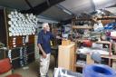 FAST volunteer archivist Graham Rood with a small selection of aeronautical drawings and artefacts