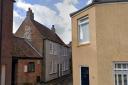 The grey house on Priory Lane in King's Lynn