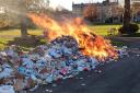 A bin lorry caught fire on Friday morning and saw its flaming contents dumped on a village green in Gainford.