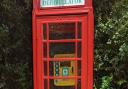 The restored phone box with its Defibrillator' sign