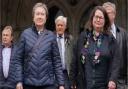 Cathy Gardner (2nd left) and Fay Harris (2nd right), whose fathers died from Covid-19, leave the Royal Courts of Justice, central London