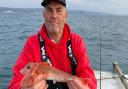 John Sherlock with a Red Gurnard