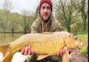 Liam O'Connor with a common carp from Newbarn