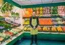 Greengrocer Andrew Beatty in his shop in Budleigh Salterton