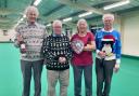 Roy Gill, Lin Hambly and Geoff Furminger, with Club President Keith Weeks (2nd left) who presented the shield to winners of Madeira Christmas Triples.