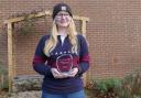 Molly Leigh with her award.