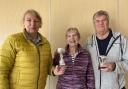 Winner Jill Hillman and runner-up Peter Phillips with Mary Knight, who presented the trophies