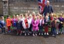 Withycombe Raleigh Primary schoolchildren planting the tree.