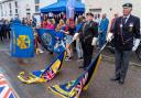 Saluting the flags at the Festival of Thanks