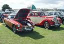 The line-up of individual classic cars includes (left to right) an MGB Roadster and a Riley RMA.