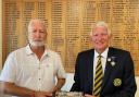 Madeira captain Dave Moody surrenders the Inkstand Trophy to Winscombe