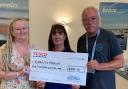 Tricia Cassel-Gerard of Exmouth Museum, Lisa O’Shaughnessy of Tesco and Mike Menhenitt of Exmouth Museum