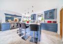 There is a Tom Howley bespoke kitchen