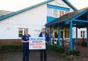 Hospiscare CEO and nurse with campaign banner