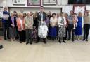 Lions Richard (centre) and Tom (far left) with members of the dancing club