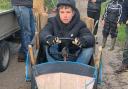 George - an under-17 competitor - trying out a ‘classic’ soap box that has been donated for the event