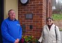 Betty Ford and Dick Francis, President of Exmouth Rotary, with the plaque at the Juniper Centre