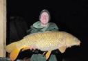 Anthony Andrews with a Common Carp caught from the specimen pool at Newbarn