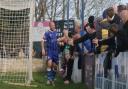 Ace High celebrates his second, and Exmouth's third goal, with the home fans