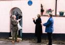 Trevor Waddington OBE, Judi Spiers and Michael Downes with the blue plaque