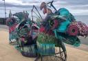 Samudra a recyclable sea dragon on Exmouth seafront.