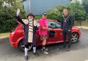 Town crier Roger Bourgein and deputy mayor Steve Gazzard at the car wash