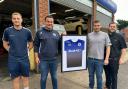 Ex Dons' Connor Harris, chairman, and Max Reader, manager and co-founder of Ex Dons with Rhys Bland, area manager and Simon Carroll, store manager of Kwik fit