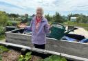 Raleigh Manor resident, Liz enjoying the Sow and Grow facility