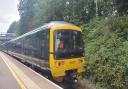 An outbound Exmouth train at Exeter Digby and Sowton.