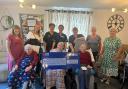 Residents and staff at the care home raised money through a cream tea garden event