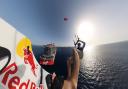 Tom Bridge completing the kitesurf from a cruise ship.