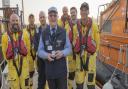 Brian Cole (middle) was rescued by the RNLI after falling off a cliff 65 years ago