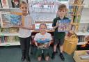 Seb, Lucas and Bells with the new puzzles, which were donated by an anonymous donor