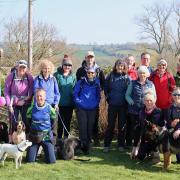 The walkers joined Anna on the way. (Anna kneeling front left, Stephen, Anna's dad second right)