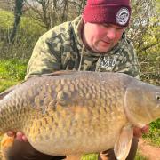 Scott Bryant with an 18lb Carp from Newbarn Angling Centre