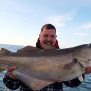 Saleem Ali with the Fish of the Month, a 17lbs Pollack