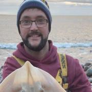 Lewis Mason with a Small eyed Ray