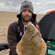 Tristan Rowe with a 3lbs 14oz Plaice