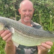 Jason Upham with a 5lbs Thin Lipped Mullet