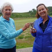 Carole Brailey presenting Sally Underwood, winner of the nett competition, with her Cup