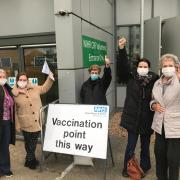 Valerie Lee (far right) became the first resident at the Old Vicarage to get the coronavirus vaccine