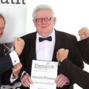 Neil Parsons receiving his Judges' Special Award at the Exmouth Business Awards in 2014. Photo by Steve Townsend of Exmouth Photo Services.