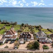 The property is positioned in an elevated position overlooking the sea