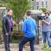 Bishop Josep Rosello being interviewed by the Spanish TV crew