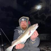 Chris Wagstaff with a small Cod