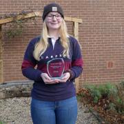 Molly Leigh with her award.