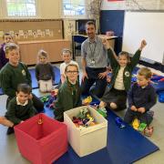 St Peter's headteacher Steve Hitchcock with pupils Ben, Noah, Edward, Oriana, Reuben, Esme, Amelie and Harrison