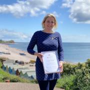 Lorraine Ralph with Coronation Champion certificate