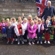 Withycombe Raleigh Primary schoolchildren planting the tree.